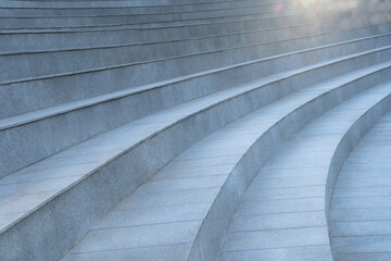 Gray steps. Architectural curvilinear design. Modern geometric monochrome background. Perspective