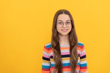 smiling schoolgirl nerd child in eyeglasses for vision, school
