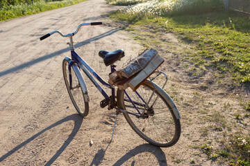Fototapeta na wymiar an old country bike with firewood
