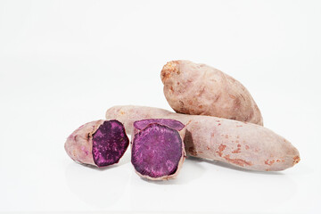 purple sweet potato close up on a white background