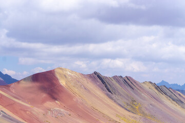 Rainbow Mountain, is a mountain in the Andes of Peru with an altitude of 5,200 metres  above sea level. It is located on the road to the Ausangate mountain.