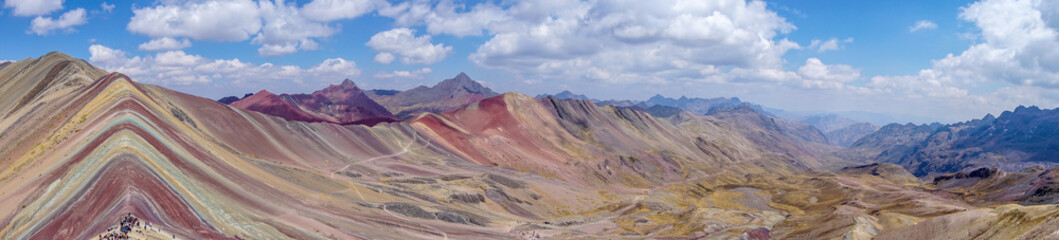 Naklejka premium Rainbow Mountain, is a mountain in the Andes of Peru with an altitude of 5,200 metres above sea level. It is located on the road to the Ausangate mountain.