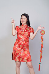 Beautiful young asian woman wearing wear chinese dress