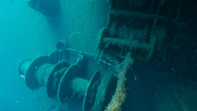 Winch on the shipwreck Swedish ferry MS Zenobia. Slow motion, Wreck diving. Mediterranean sea, Cyprus