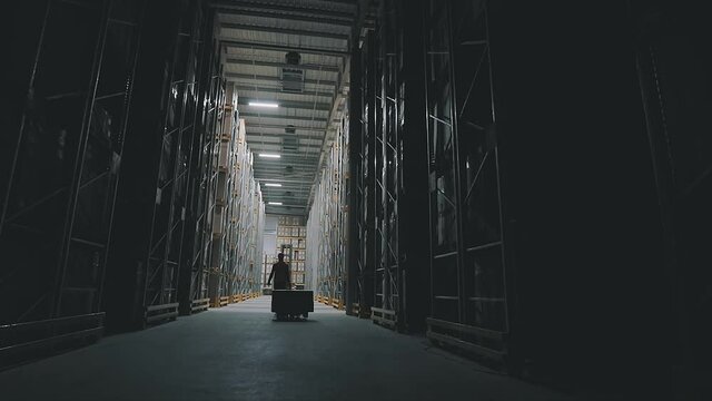 End of the working day at the factory. Turning off the lights in the warehouse
