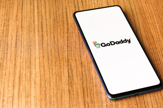 Assam, india - April 10, 2021 : GoDaddy logo on phone screen stock image.