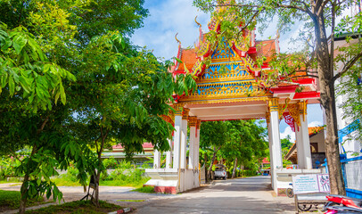 Colorful architecture of entrance gate Wat Plai Laem temple Thailand.