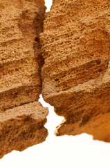 Close-up detail of sandstone rock shapes and lines at Punta de Sa Gavina in Ses Salines Natural Park (Formentera, Balearic Islands, Mediterranean sea, Spain)