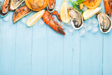 Seafood dinner, seafood dinner with fresh lobster, crab, mussel and oyster as background