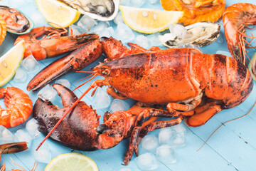 Seafood dinner, seafood dinner with fresh lobster, crab, mussel and oyster as background