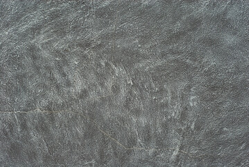 Decorative plaster close up. Texture of concrete wall. Concrete is made in the form of rubbed iron.