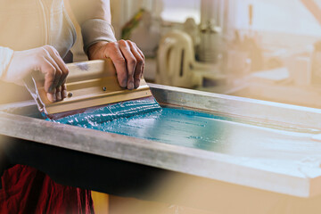 serigraph printing production. silk screen textile printery. manual screen printing design studio....