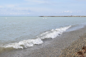 Fototapeta na wymiar Black sea, pebble beach. Anapa resort town, summer.