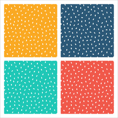 Set of 4 colorful seamless patterns with white sprinkles