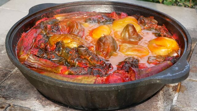 Middle Eastern dolma or stuffed vegetables are boiled in a large pot. Classical Armenian, Azerbaijani and Turkish meal. Outdoor cooking