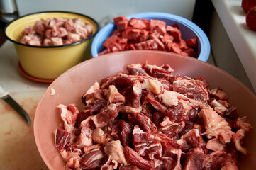 preparation of food for raw feeding. BARF food for dogs and cats. Packaging of food for animals.