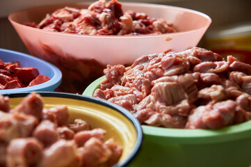 preparation of food for raw feeding. BARF food for dogs and cats. Packaging of food for animals.
