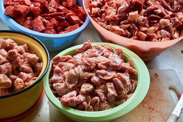 preparation of food for raw feeding. BARF food for dogs and cats. Packaging of food for animals.