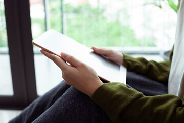 Closeup woman hand touch screen on tablet, marketing technology and business concept.