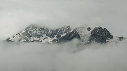 Fototapeta na wymiar Mountain in clouds