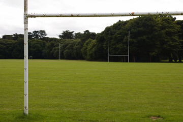 Hurling goal posts in empty football field in the park, St Anne's park, Dublin, Ireland