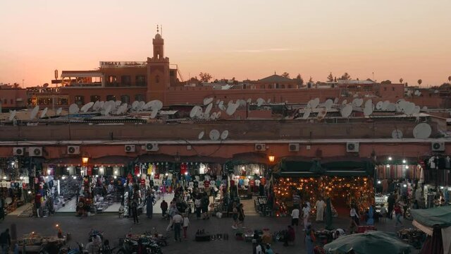 MARRAKECH, MOROCCO - MAY 15 2019: Djemaa El-fna at Marrakech, Morocco. Top view of the UNESCO square on ramadan kareem on sunset