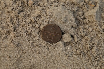 Old Russian copper coin on the ground