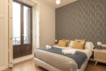 Bedroom with king size bed in vacation rental apartment