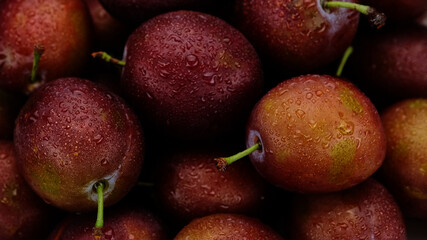 Fresh plums top view, rotation. Healthy Nutrition concept