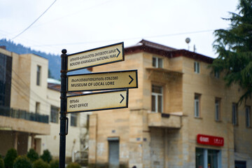 A road sign describing where the direction leads