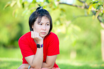 Young woman with sadness at sunset alone.