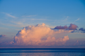 Sunrise lights up the huge clouds in the Gulf Of Mexico as seen from the seven mile bridge