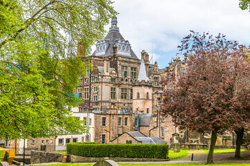 A view across Greyfriars Graveyard towards the Central Library in Edinburgh, Scotland on a summers day