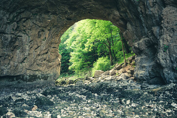 Natural stone arch bridge in the Rakov Škocjan Landscape Park