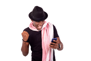 young happy man holding mobile phone.