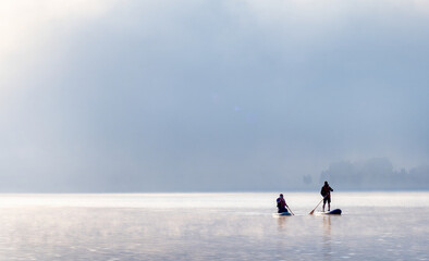rowers crossing the lake in the morning mist © Prajzner
