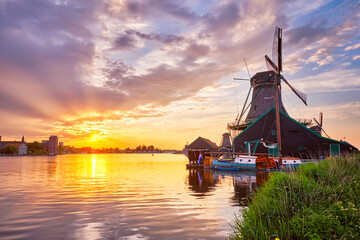 Windmills at Zaanse Schans in Holland on sunset. Zaandam, Nether