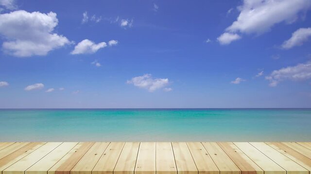 Wood table on beach and coconut tree in summer. Sea view background. Nature and travel concept.
