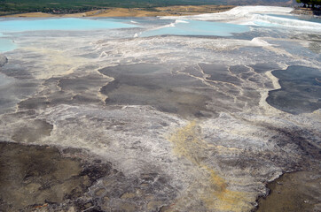 Natural travertine pools and terraces in Pamukkale. Cotton castle in southwestern Turkey. Pamukkale travertine and ancient city of Hierapolis.