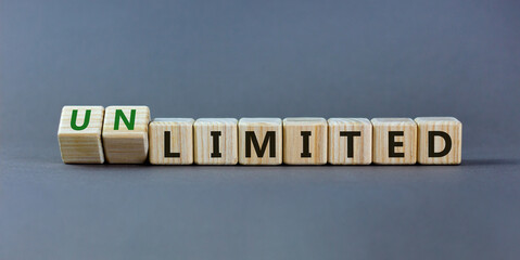 Limited or unlimited symbol. Turned wooden cubes and changed words 'limited' to 'unlimited'. Grey...