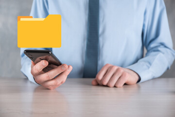 Businessman hold folder icon.Document Management System or DMS setup by IT consultant with modern...