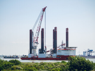 Fototapeta premium Offshore construction vessel on the way to the north sea out of Rotterdam port