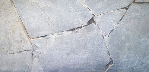 Gray concrete background. Grey cracked cement wall or marble wallpaper in vintage tone. line pattern on granite floor. 