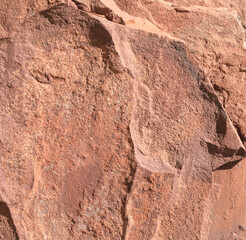 background and texture of red granite rock