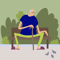 A cute old man feeds pigeons on a bench in the park. An elderly man in glasses with a cane and slippers.