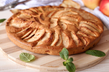Appetizing pie close-up on a wooden background