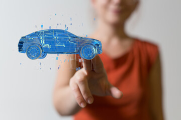 Man holding and touching holographic smart car