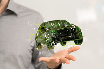 Man holding and touching holographic smart car