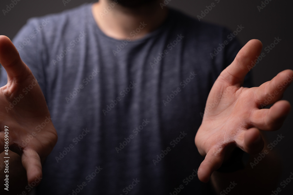 Poster man showing his empty hand.