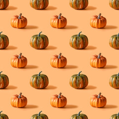 Seamless pattern of Thanksgiving day or Halloween pumpkin on orange background. Autumn harvest abstract texture.
